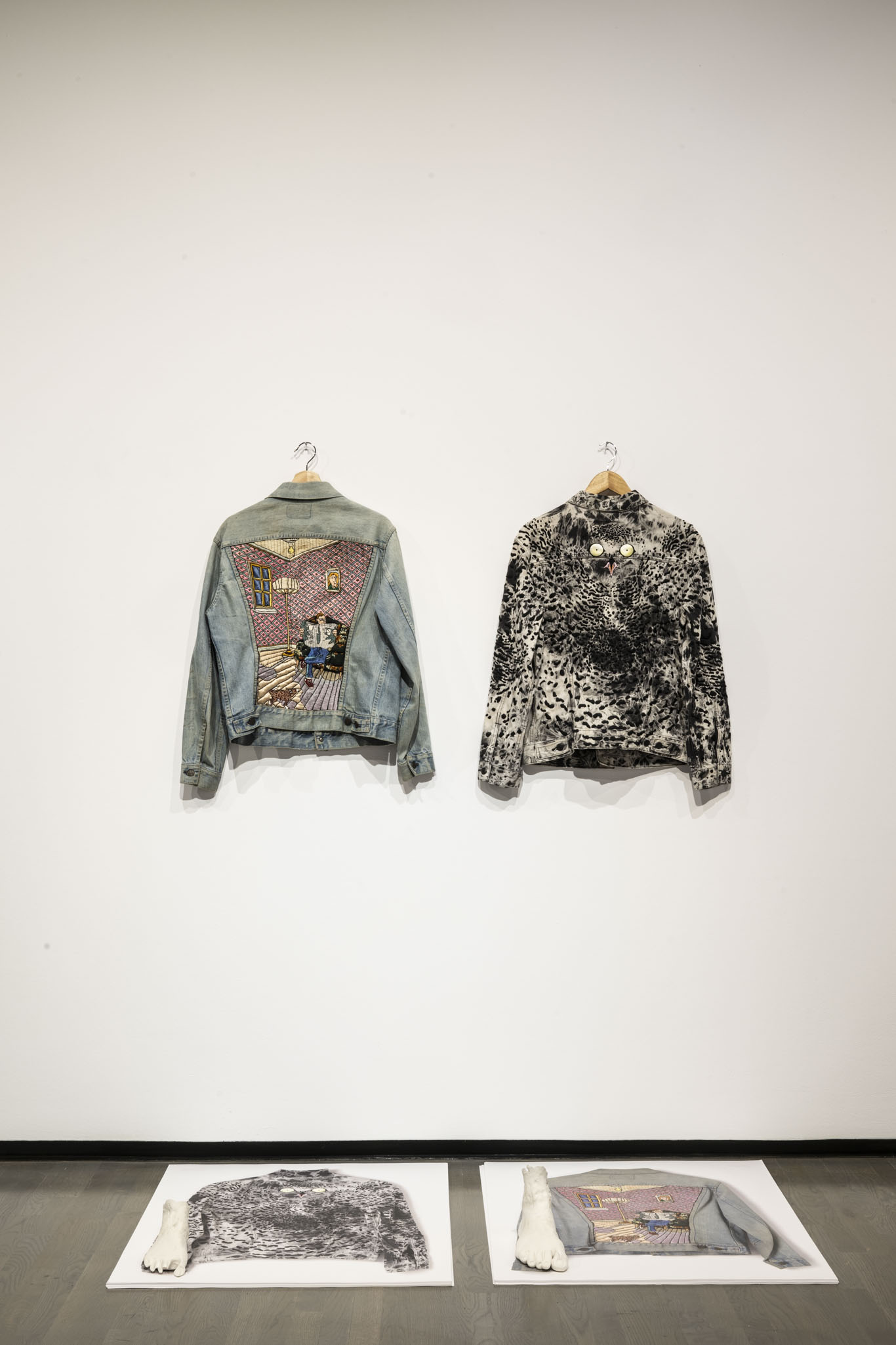 Installation view of Elliptical Lineages , Walter Phillips Gallery, Banff Centre for Arts and Creativity, 2025. From top to bottom: John de Haan & Jason de Haan, When the Last Earth - Tie is Sundered (My jacket and my Son ’ s / My Father ’ s jacket and mine) , 1975/2025, courtesy of the artists and Clint Roenisch Gallery; Jason de Haan, Proposals for a Maritime Monument , 2016, courtesy of the artist and Clint Roenisch Gallery. Photo: Rita Taylor.
