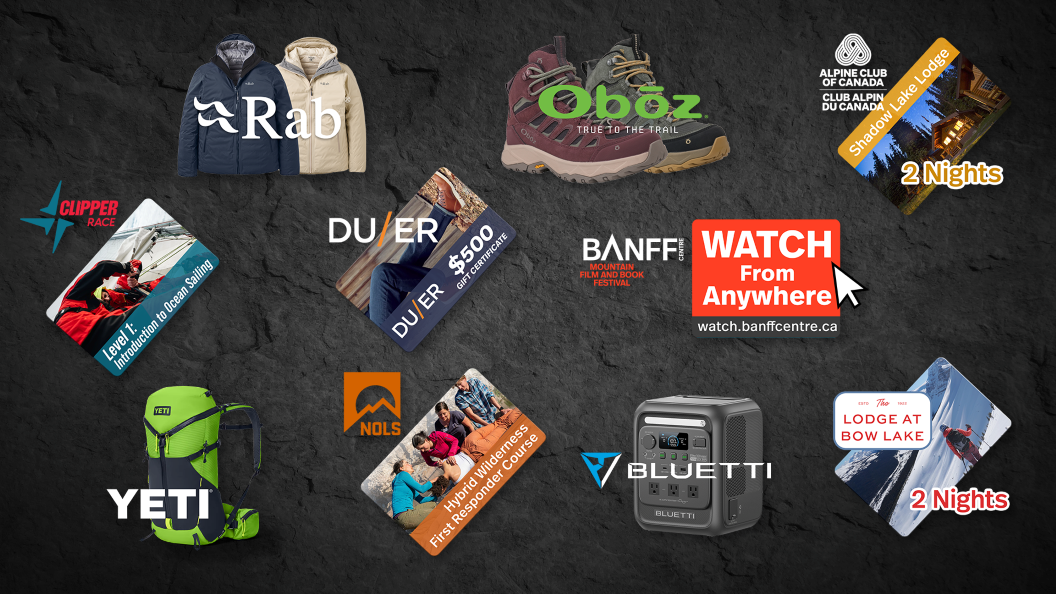 A grey sotne background is covered with images of prizes available to win.