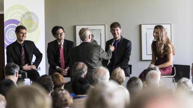 The Dover Quartet, (from left): Joel Link, Bryan Lee, Camden Shaw, and Milena Pajaro-van de Stadt, with broadcaster Eric