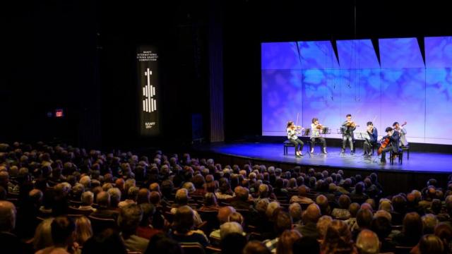 Quartet performing on stage