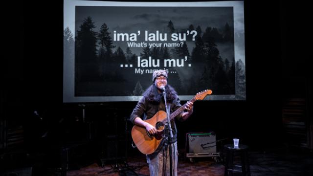 Mauna Delau playing guitar at Wîchoîe Ahiya Concert Participant Concert, 2023, photo by Rita Taylor.