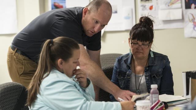 Faculty member Dan McCarthy works with 2016 participants.