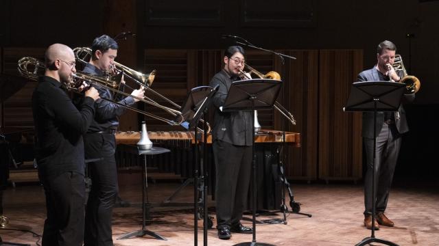 Interplay Chamber Music Concert, 2024. L to R: Lee Allen (alto trombone), Jihong Son (tenor trombone), Charlie Cao (tenor trombone), and  DJ Combs (bass trombone). Photo by Abigaile Edwards.