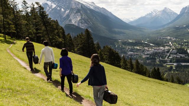 String quartet walking on Mt. Norquay, Banff, AB