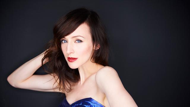 Sarah Slean in a blue gown