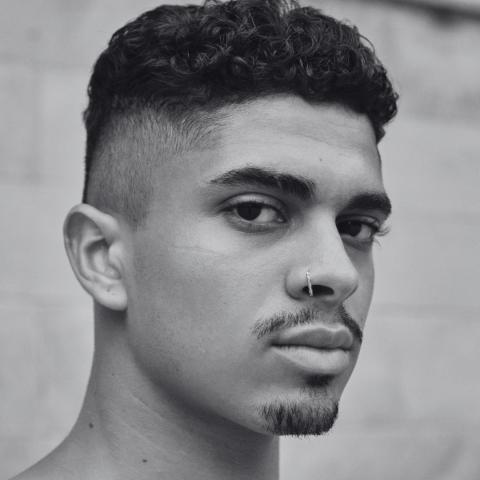 Black and white photo of close up headshot