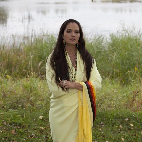 Roxann Whitebean in a yellow shawl