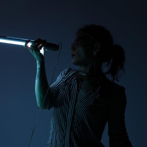 Portrait of Victoria Bell in profile.